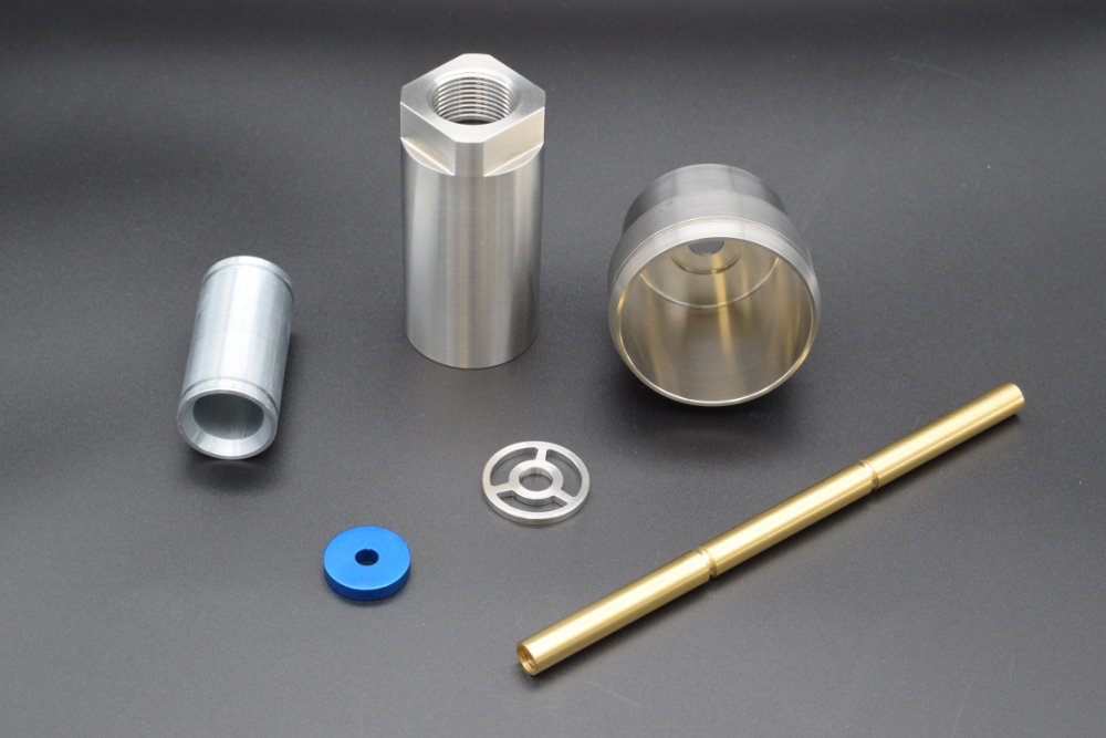 a selection of turned components